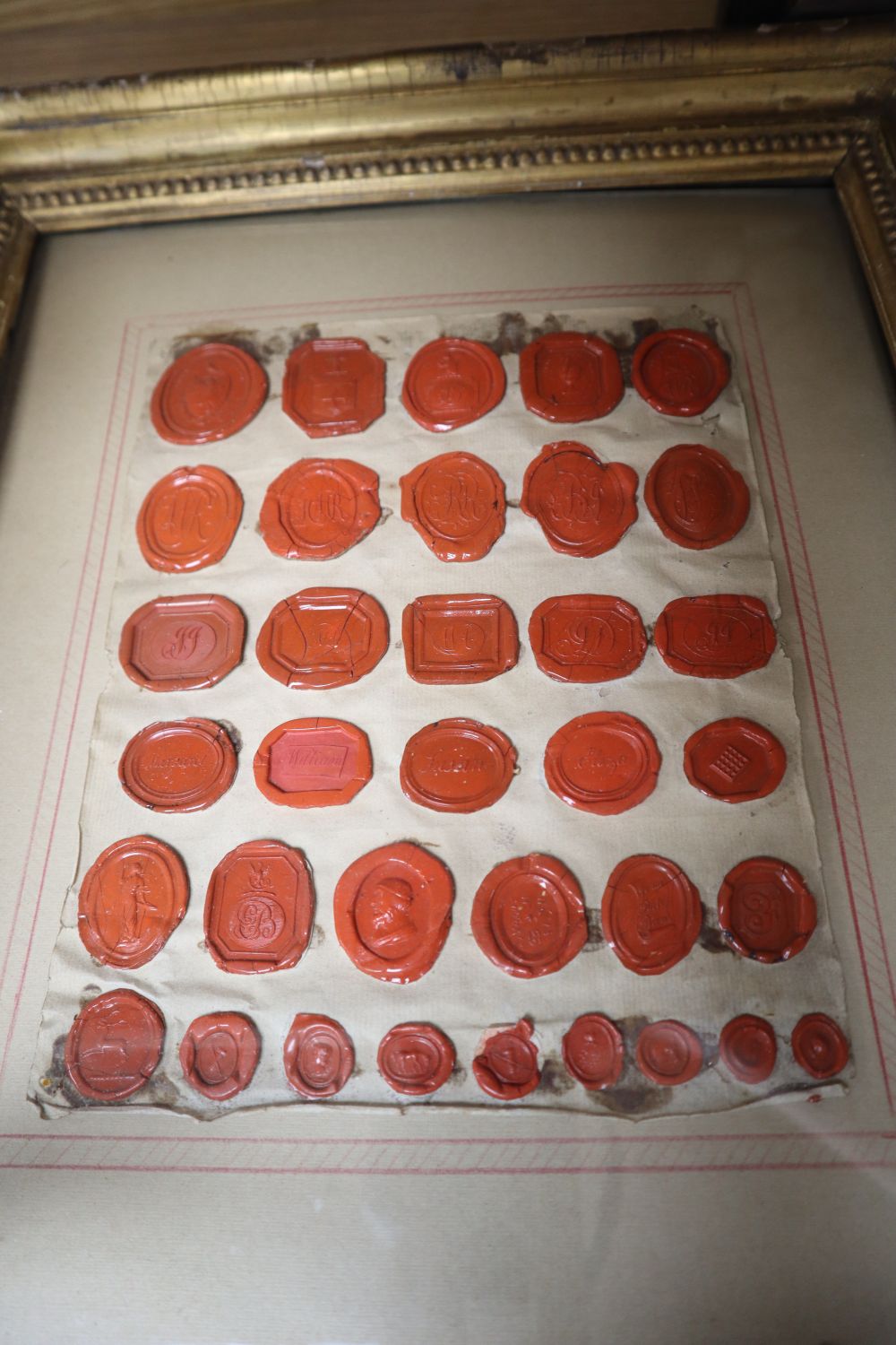 A framed group of intaglios and two framed groups of seals